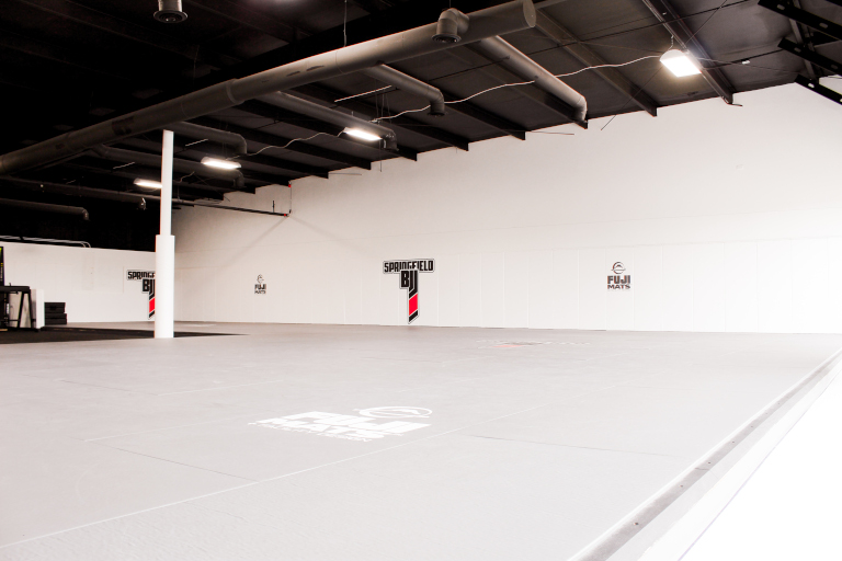 a picture of the mat space at the academy